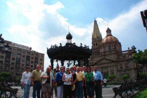 Ohio soybean farmer Christopher Gibbs (seventh from left) and United Soybean Board Audit and Evaluation Chair Jim Stillman (sixth from right) take time out from a walking tour of downtown Guadalajara, Mexico to pose with the rest of the See for Yourself participants for a group photograph.   