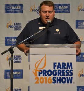 Dion McBay, Monsanto, unveils the results of the new report, "“Charting a Path to Carbon Neutral Agriculture: Mitigation Potential for Crop Based Strategies," during the 2016 Farm Progress Show.